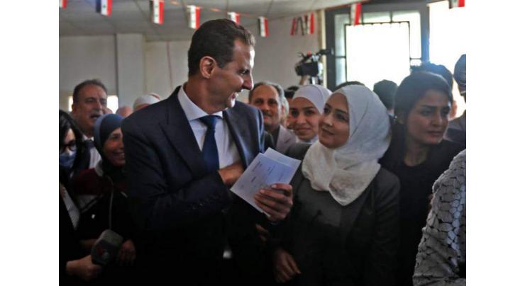 Assad dismisses critics as Syria votes to extend his grip on power
