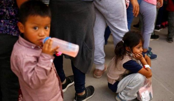 US to begin reuniting migrant families separated under Trump