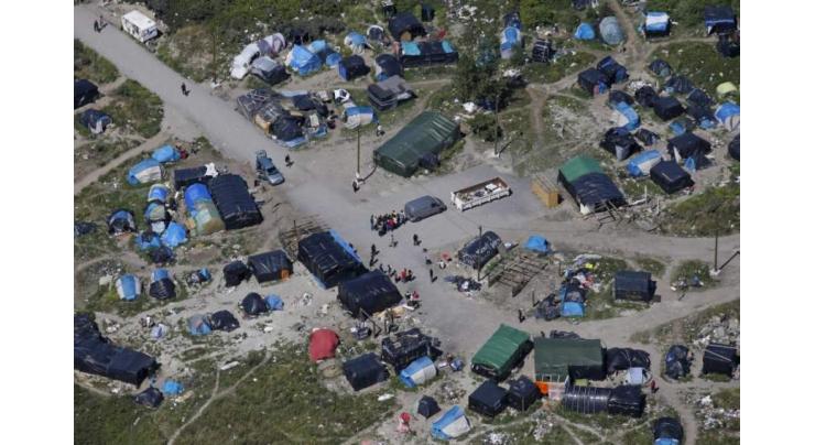 French authorities dismantle new Calais migrant camp
