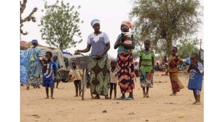 Thousands of women and children flee Burkina Faso massacre
