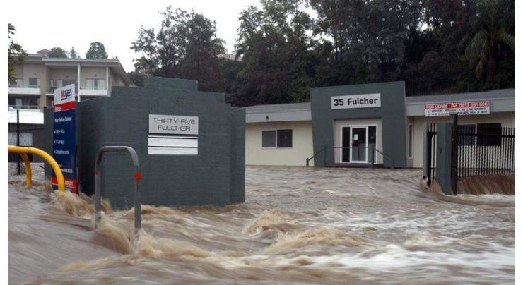 Man dies in flood as wild weather hits Australia
