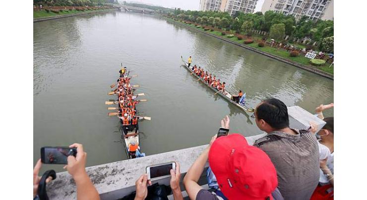 Red tourism flourishes during China's Dragon Boat Festival holiday
