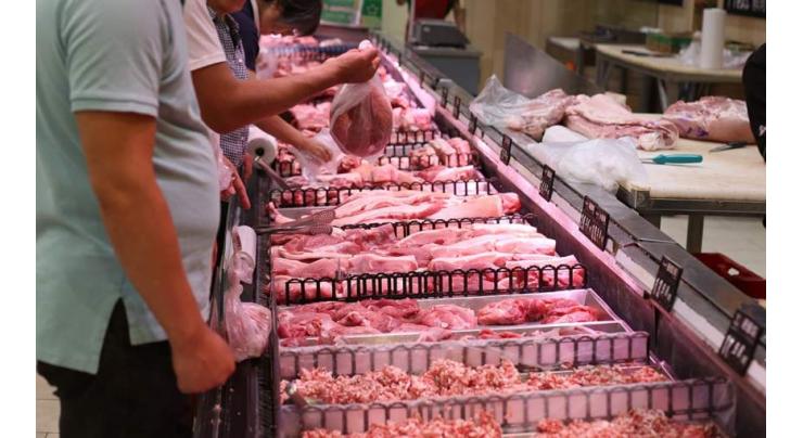 China issues alert on hog price slump
