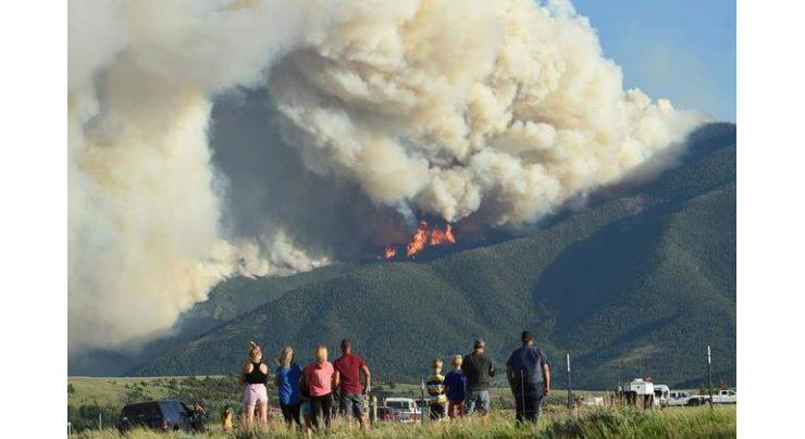Wildfire in U.S. Montana forces evacuation of hundreds of homes
