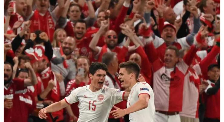 Denmark 'unit' rides wave of emotion into Wales last-16 clash
