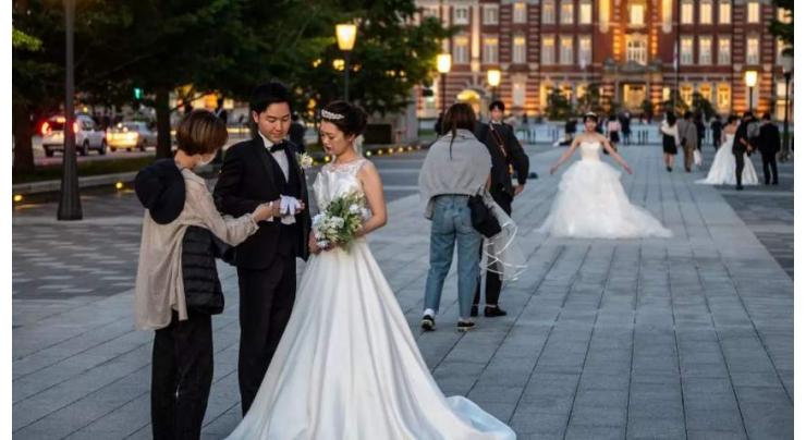 Japan top court backs ban on separate married surnames: media
