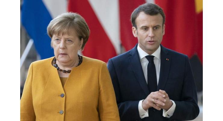 Kiev Concerned by Macron, Merkel's Initiative to Resume EU Summits With Russia