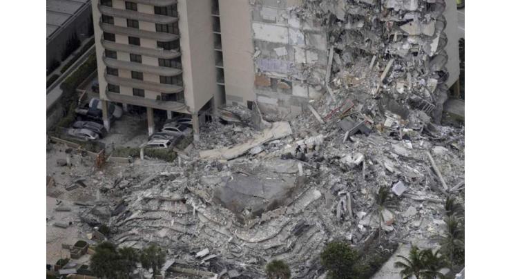 One dead, dozens unaccounted for in Florida apartment block collapse
