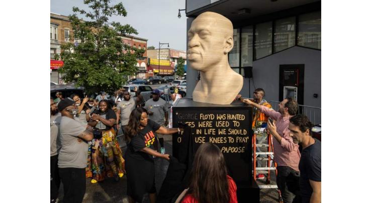 Neo-Nazi group name scrawled on New York George Floyd statue

