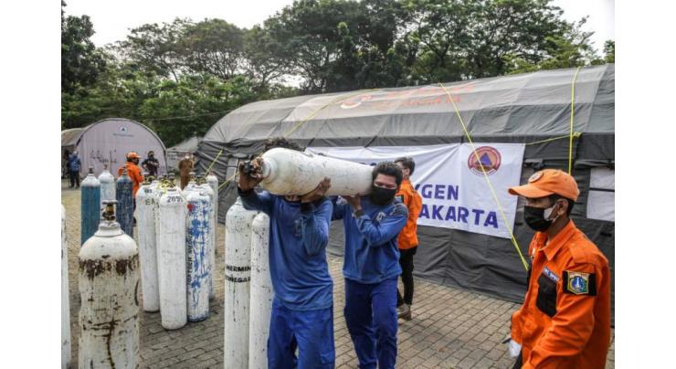 Virus-hit Indonesia orders oxygen for jammed hospitals

