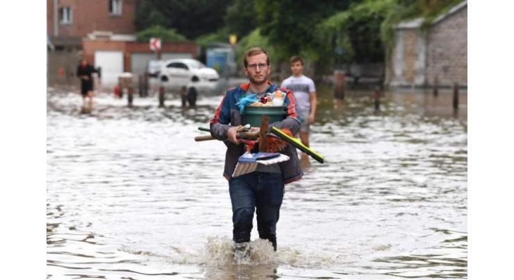 Belgian flood victims face long, grim summer clean-up
