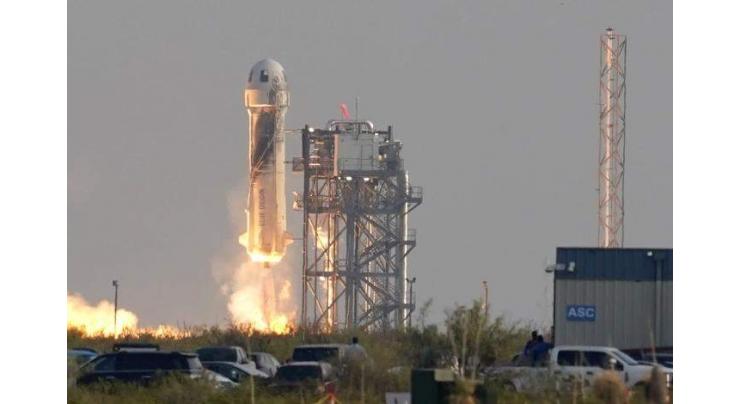 Amazon magnate Bezos blasts into space on own rocket
