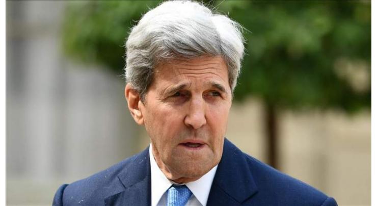 Kerry urges China to help solve climate challenge
