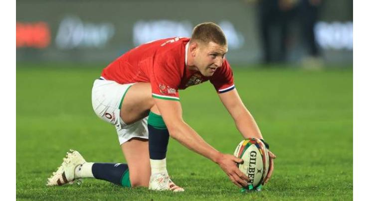 Lions fly-half Russell to resume training in South Africa
