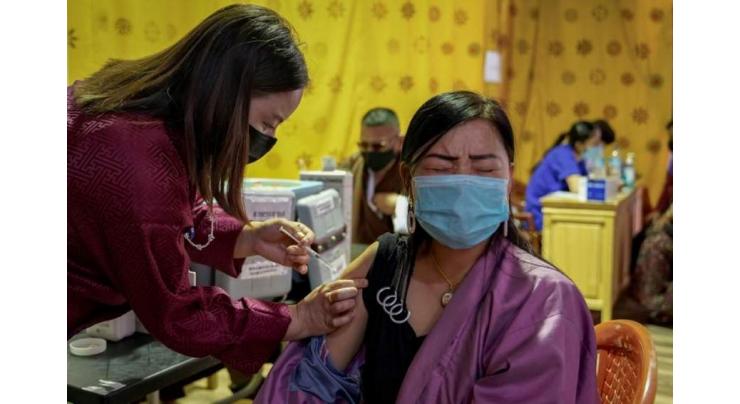 'Success story': Bhutan vaccinates most of population after donations
