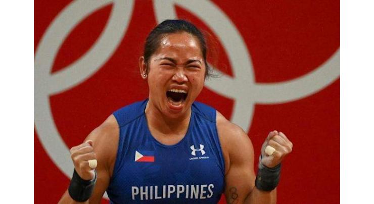 'So proud': Philippine weightlifter Diaz hailed for historic Olympic gold
