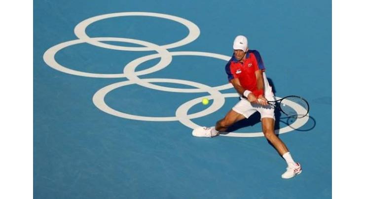 Djokovic rolls at Olympics as Medvedev suffers in extreme heat
