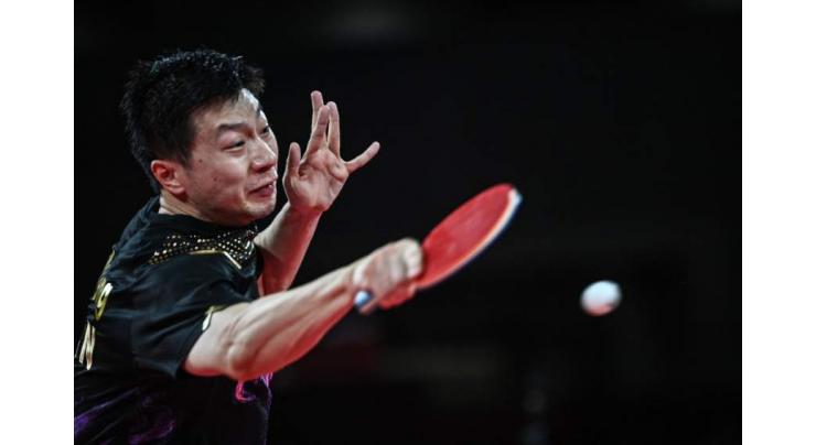 China's 'Dictator' Ma Long retains Olympic table tennis crown
