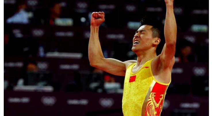 Dong Dong makes Olympic history on Tokyo trampoline
