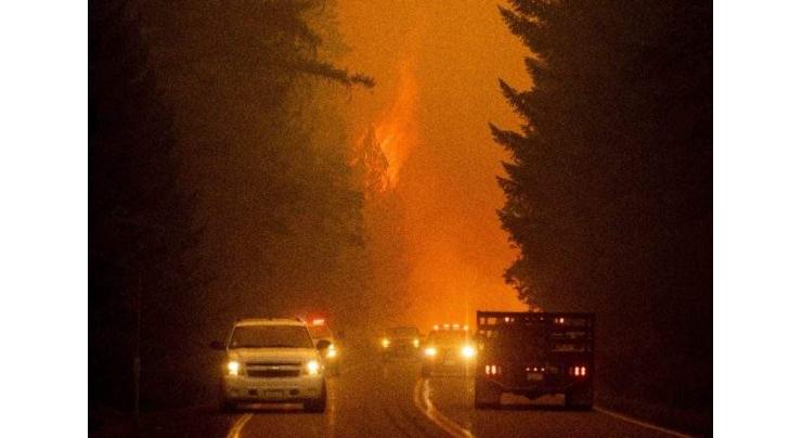 Dixie fire levels California community as residents flee blaze
