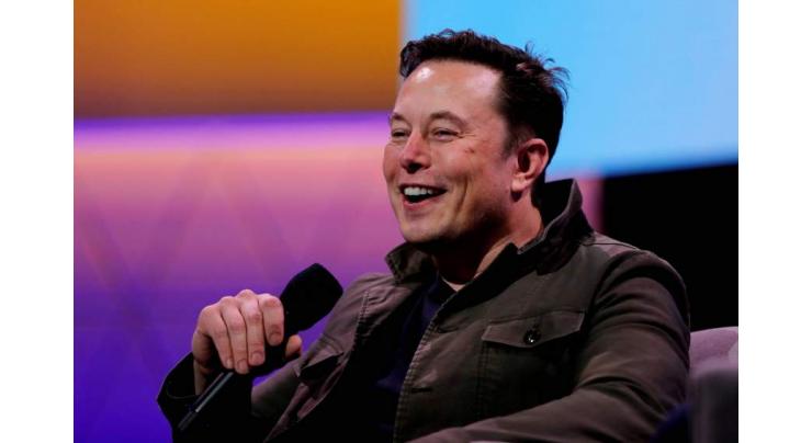 Elon Musk says Tesla's robot will make physical work a 'choice'
