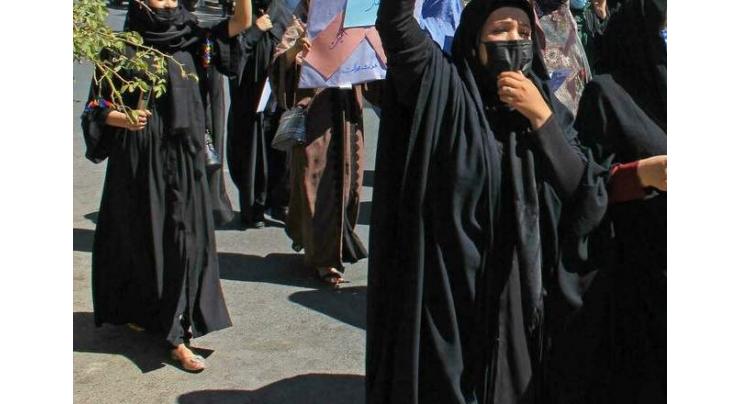 Afghan women call for respect in rare protest

