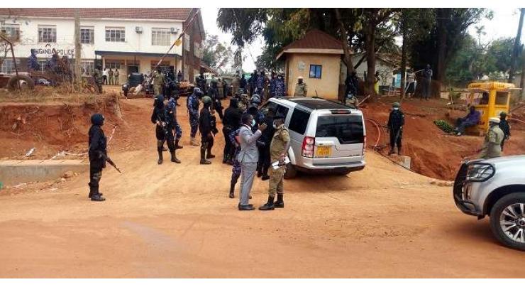 Uganda accuses opposition MPs over machete killings

