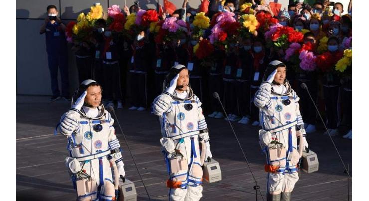 Chinese astronauts return to Earth after 90-day mission
