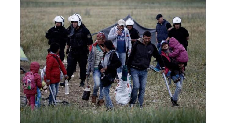Greece begins moving migrants to new 'closed' camp
