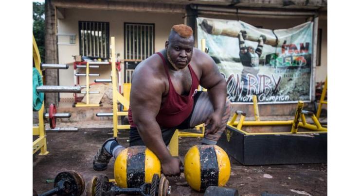 Burkina's Iron Biby powerlifts into record books -- and nation's heart
