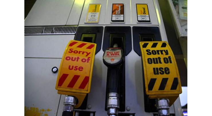 UK urges public calm over shut fuel stations
