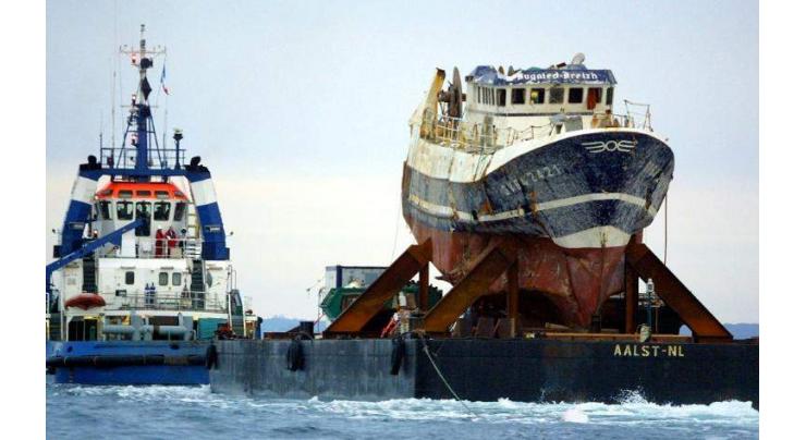End 'cover-up', French minister urged over sunk trawler
