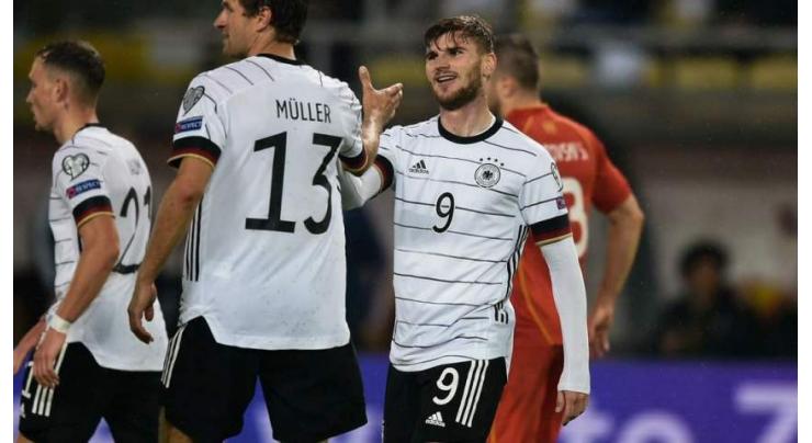 Germany qualify for Qatar 2022 but Belgium made to wait
