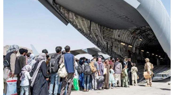 Second Afghan refugee flight headed for Spain
