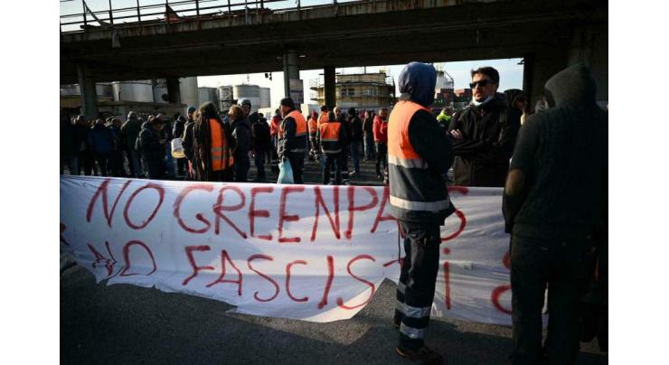 Protests and blockades greet new Italy Covid rules
