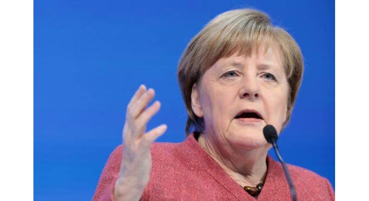 Merkel gets standing ovation in final EU summit
