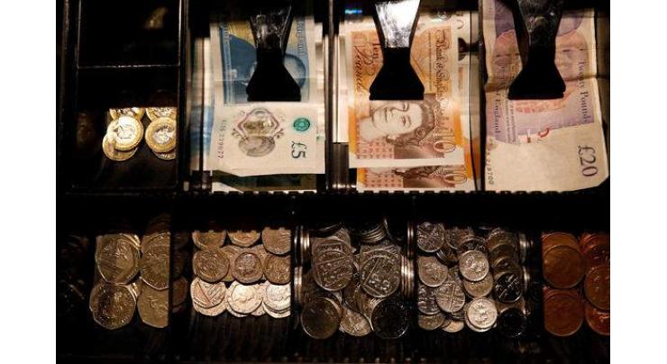 UK raises minimum hourly wage to 9.50 pounds
