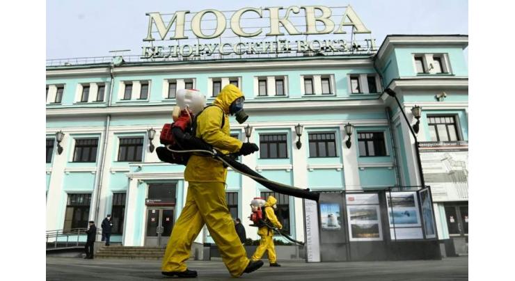 Moscow shuts non-essential services after virus surge
