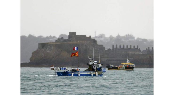 After threats, France opens door to talks on fishing feud
