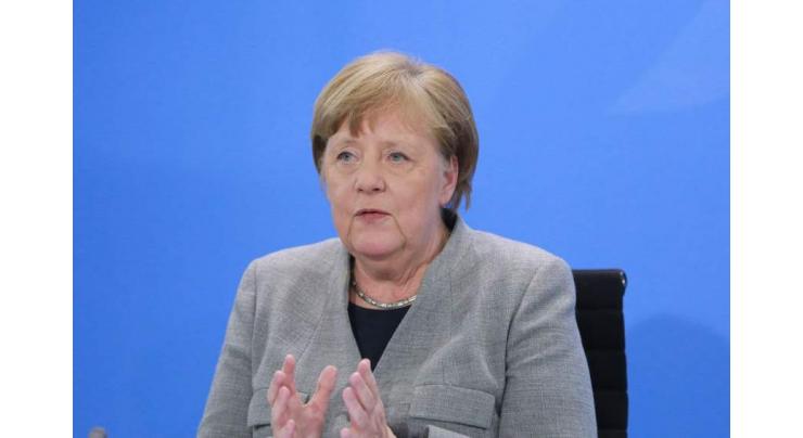 Talks to succeed Merkel hit snags over climate, finance
