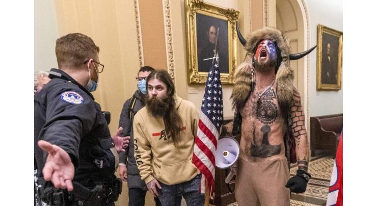 US Court Sentences 'QAnon Shaman' to 41 Months for Role in Capitol Riot - Reports