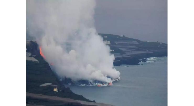3,000 shut indoors on Spanish island as lava reaches sea
