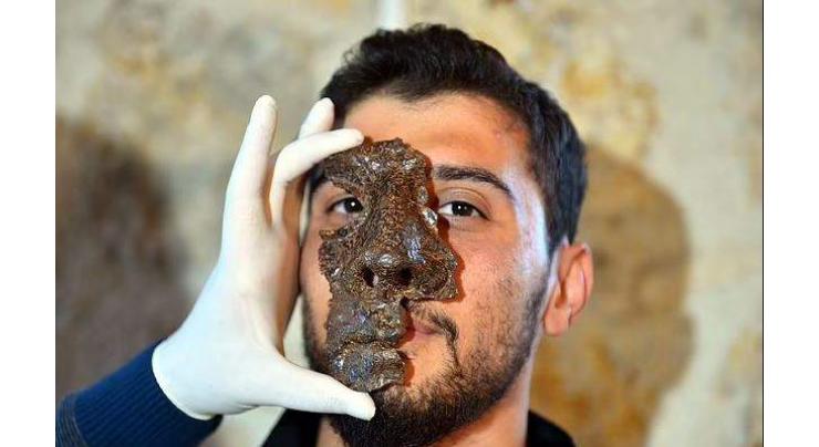 Archaeologists unearth iron mask in northern mask
