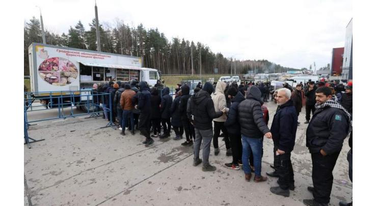 Poland says 230 migrants crossed Belarus border by force
