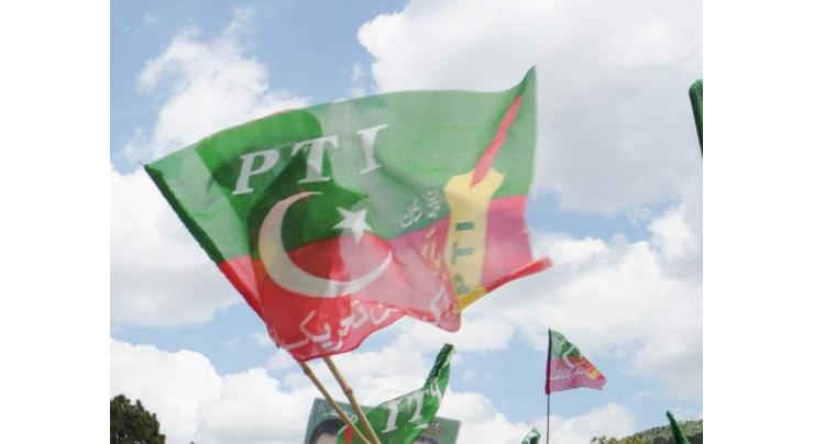 PTI holds protest against murder of political worker
