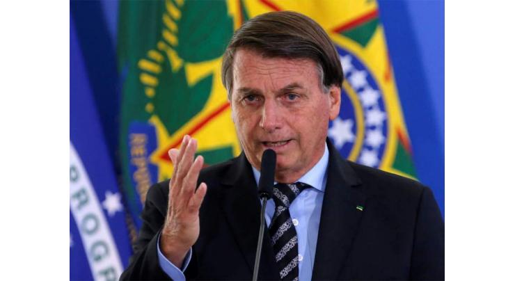 Brazil's Bolsonaro joins Liberal Party ahead of 2022 vote

