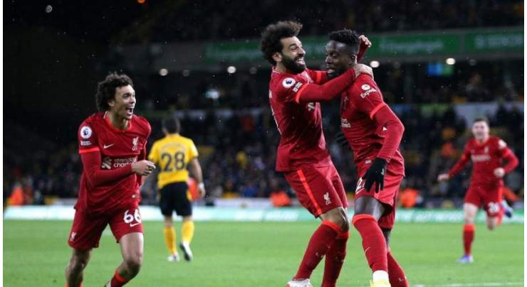 Origi tames Wolves to take Liverpool top of Premier League
