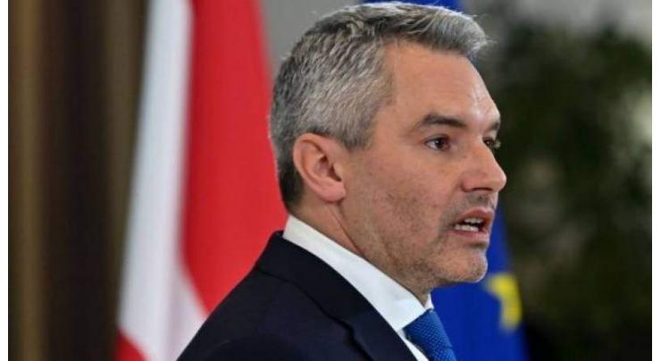 New Austria chancellor sworn in as graft fallout swirls
