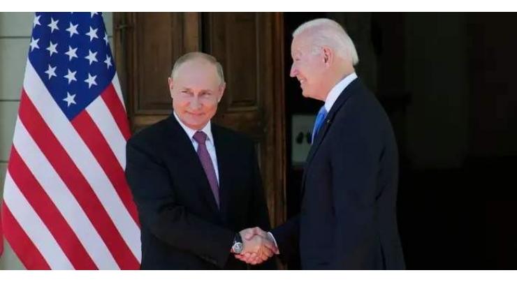 Putin Greets Biden With Smile During Online Meeting