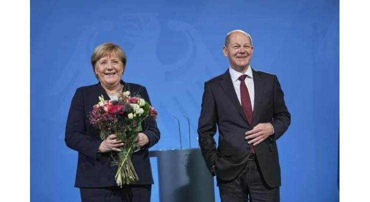Departing Merkel urges Scholz to work in Germany's 'best interest'
